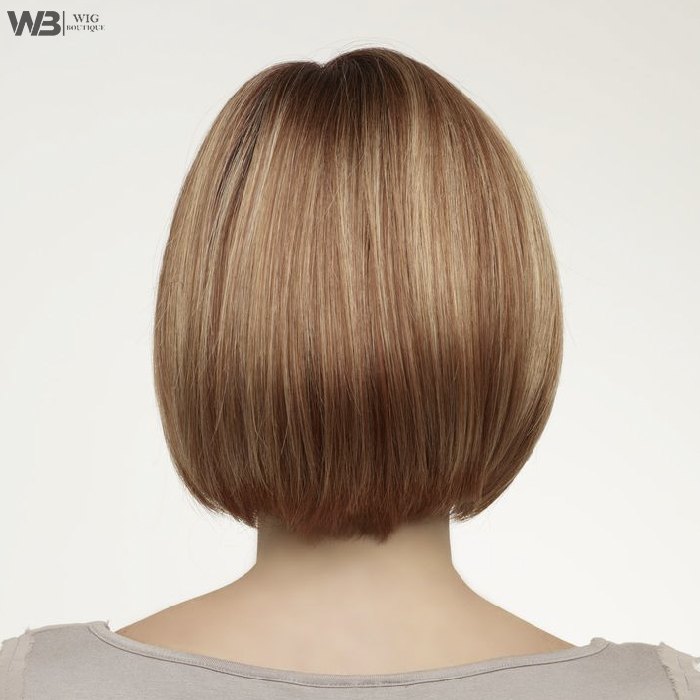 Close-up of a beautiful, flowing natural human hair wig, showcasing its realistic texture and subtle sheen.